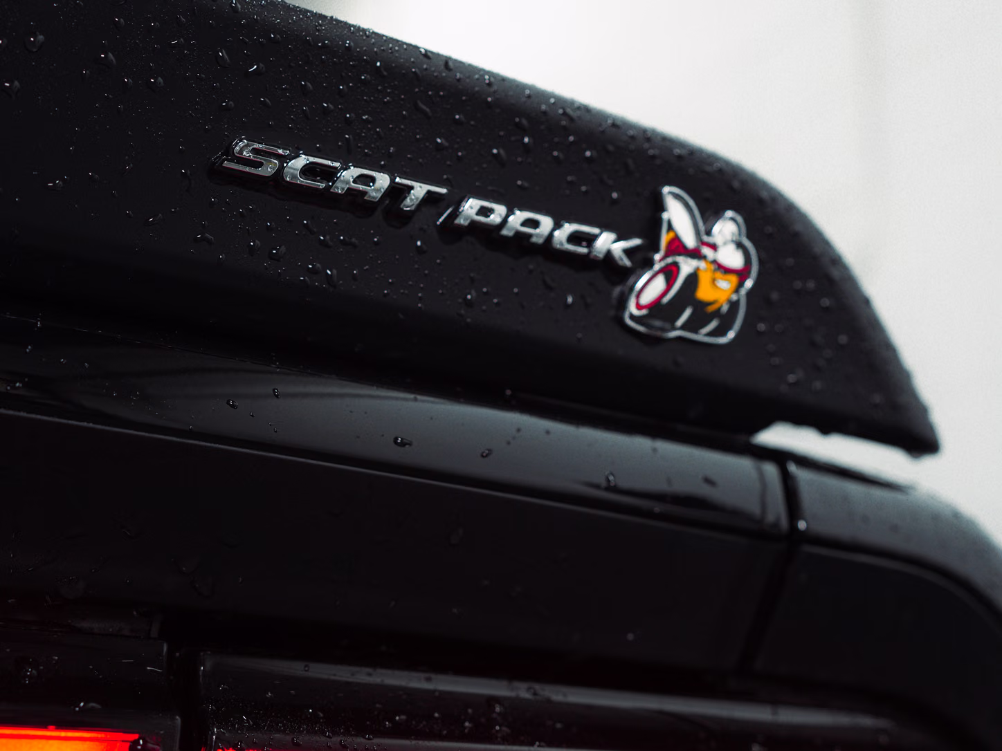 Scat Pack badge on a black Challenger